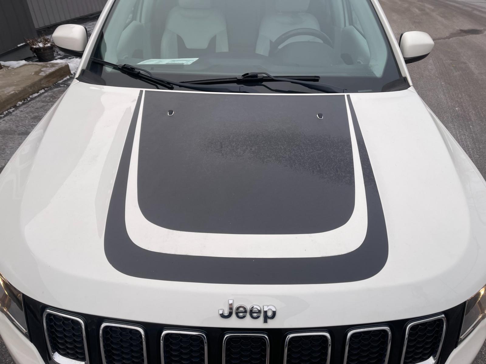 2018 White /White Jeep Compass Latitude 4WD (3C4NJDBB3JT) with an 2.4L I4 DOHC 16V engine, 9 Speed Automatic transmission, located at 11115 Chardon Rd. , Chardon, OH, 44024, (440) 214-9705, 41.580246, -81.241943 - This 2018 Jeep Compass Latitude 4WD with a 2.4-liter engine and 9-speed automatic transmission offers a blend of utility and comfort with its heated leather seats and dual-zone automatic climate control. The 8.4-inch touchscreen provides user-friendly access to navigation, Apple CarPlay, and Android - Photo #17
